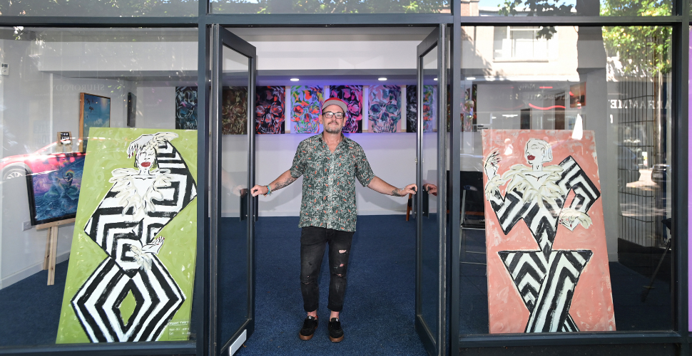 Billy Finch, curator outside the pop-up gallery